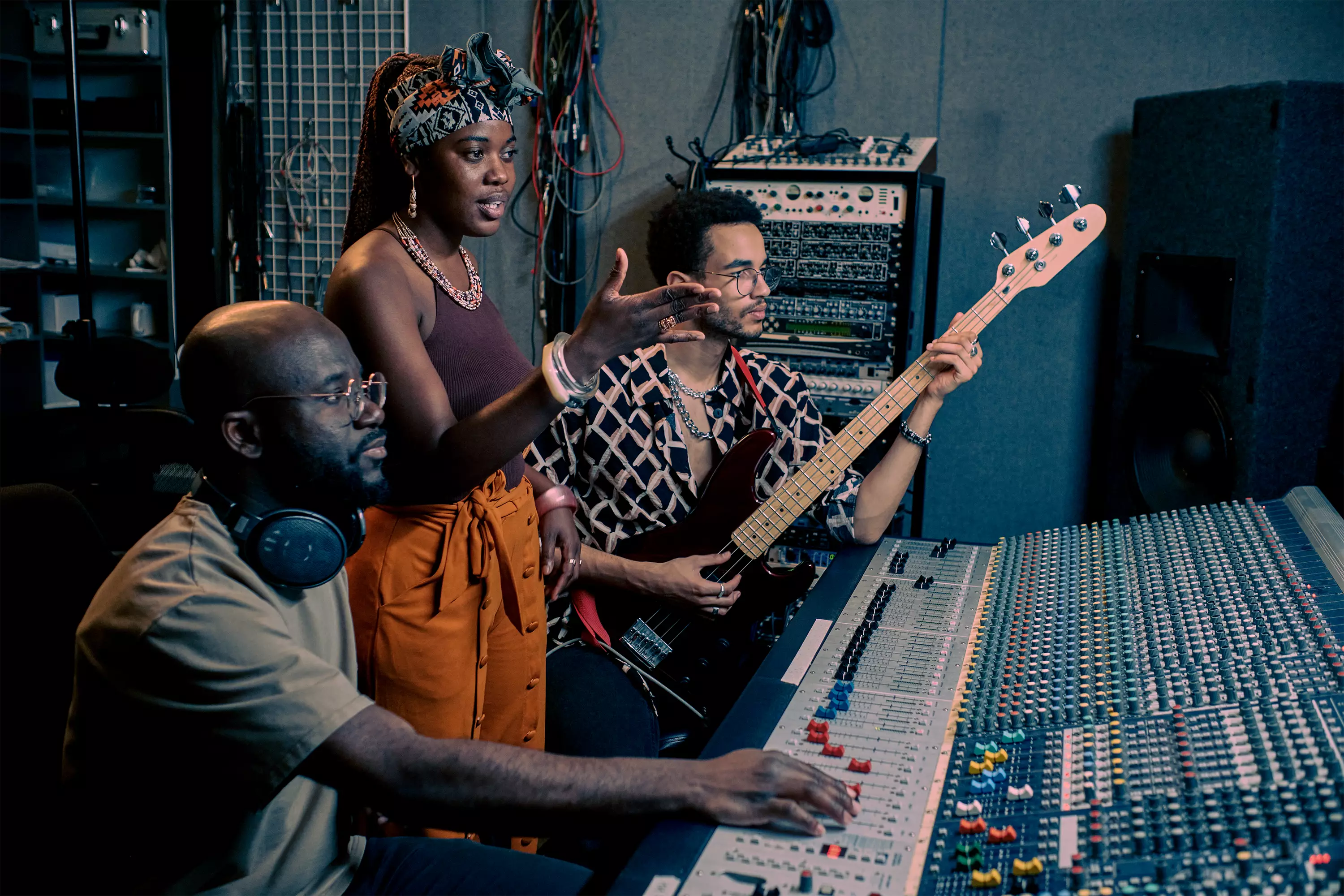 A label team working together in a recording studio